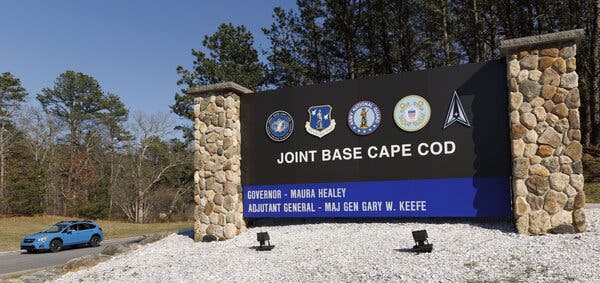 A sign between two pillars reads Joint Base Cape Cod.