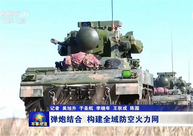 PGZ07_35mm_cannon_and_HQ17_surface-to-air_defense_missile_systems_in_service_with_Chinese_army_640_002.jpg