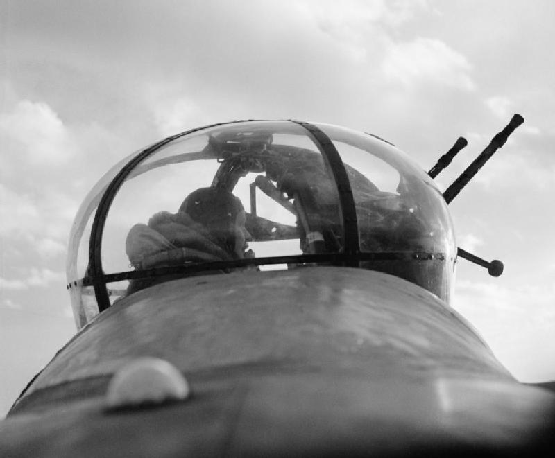 A_No._57_Squadron_Lancaster_mid-upper_gunner_in_his_turret%2C_February_1943._CH8795.jpg