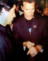 200330-arnold-schwarzenegger-sylvester-stallone-gold-plated-luminor-logo-panerai-wrist-planet-...jpg