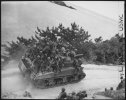 Tank-borne_infantry_moving_up_to_take_the_town_of_Ghuta_before_the_Japanese_can_occupy_it._The...jpg