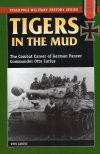 Tigers in the mud.jpg