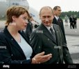 finnish-foreign-trade-minister-paula-lehtomaki-left-speaks-with-russian-president-vladimir-put...jpg