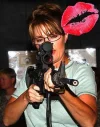 palin-rifle-lipstick-wolf-hunting-hockey-mom-pit-bull.webp