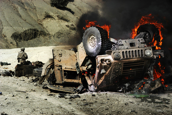 An+American+Military+vehicle+is+burning+after+hitting+an+IED.jpg