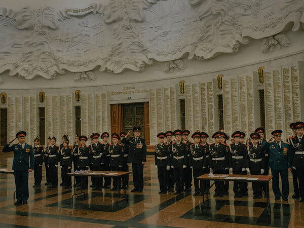 Cadet students stand in attention and salute at Moscow’s Victory Museum honoring Russia’s defeat of Nazi Germany in World War II.