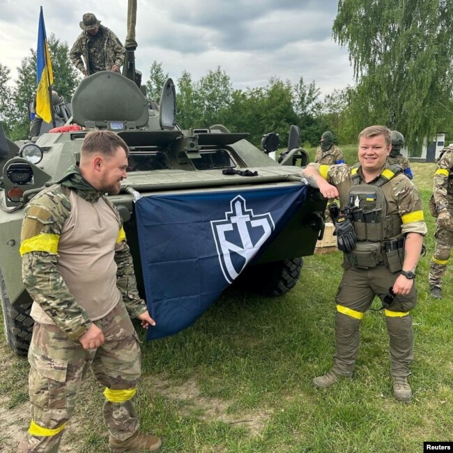 Oleksandr Sachkov (right), a Russian neo-Nazi, a fan of Hitler, was arrested in 2019 in Ukraine for creating a neo-Nazi organization, but later released on bail