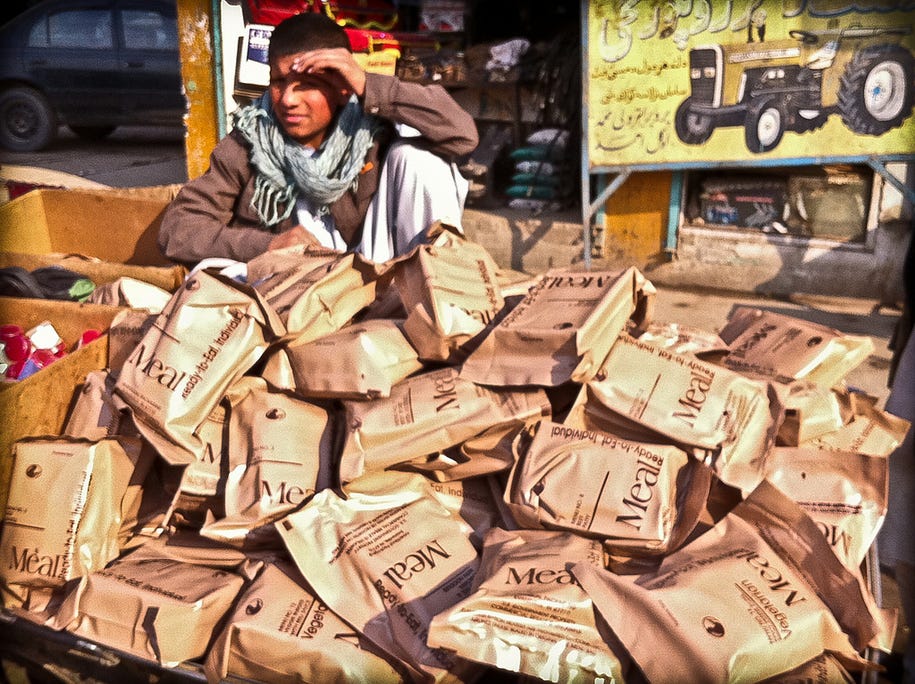 bigger-afghan-cities-tend-to-have-underground-bush-markets-where-stuff-that-falls-off-the-back-of-the-truck-like-these-mres-intended-for-american-troops-are-sold-for-as-little-as-20-cents.jpg