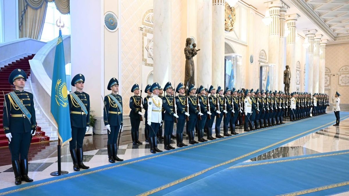 A formal welcoming ceremony in Akorda, a line of military personnel in full dress uniform