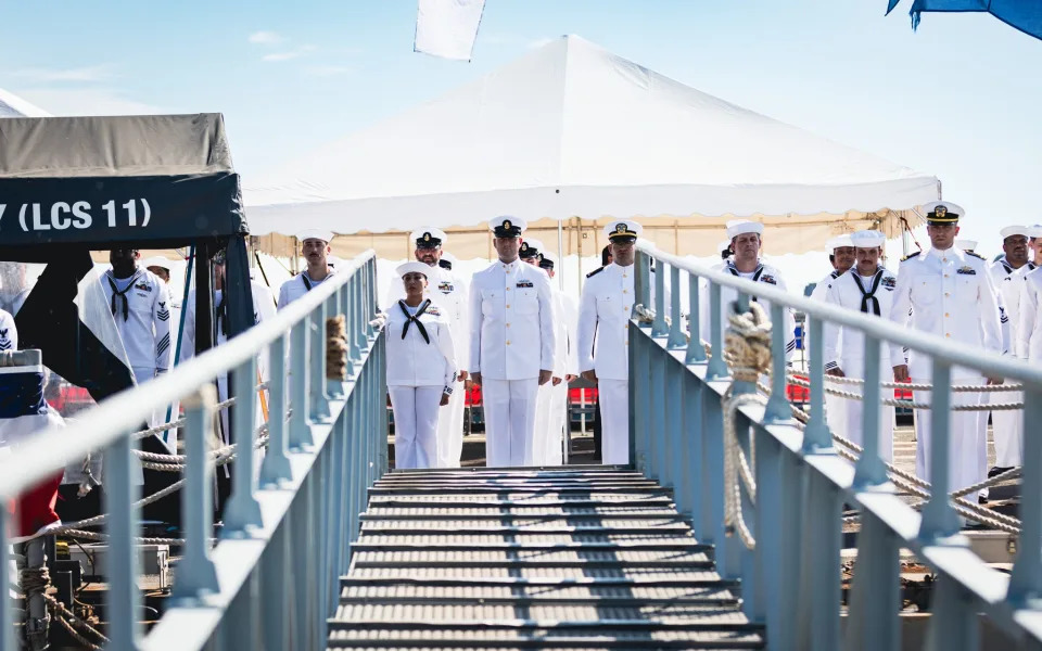 Sailors attached to the USS Sioux City (LCS 11), stand in ranks during a decommissioning ceremony for the ship at Naval Station Mayport, Aug. 14, 2023.