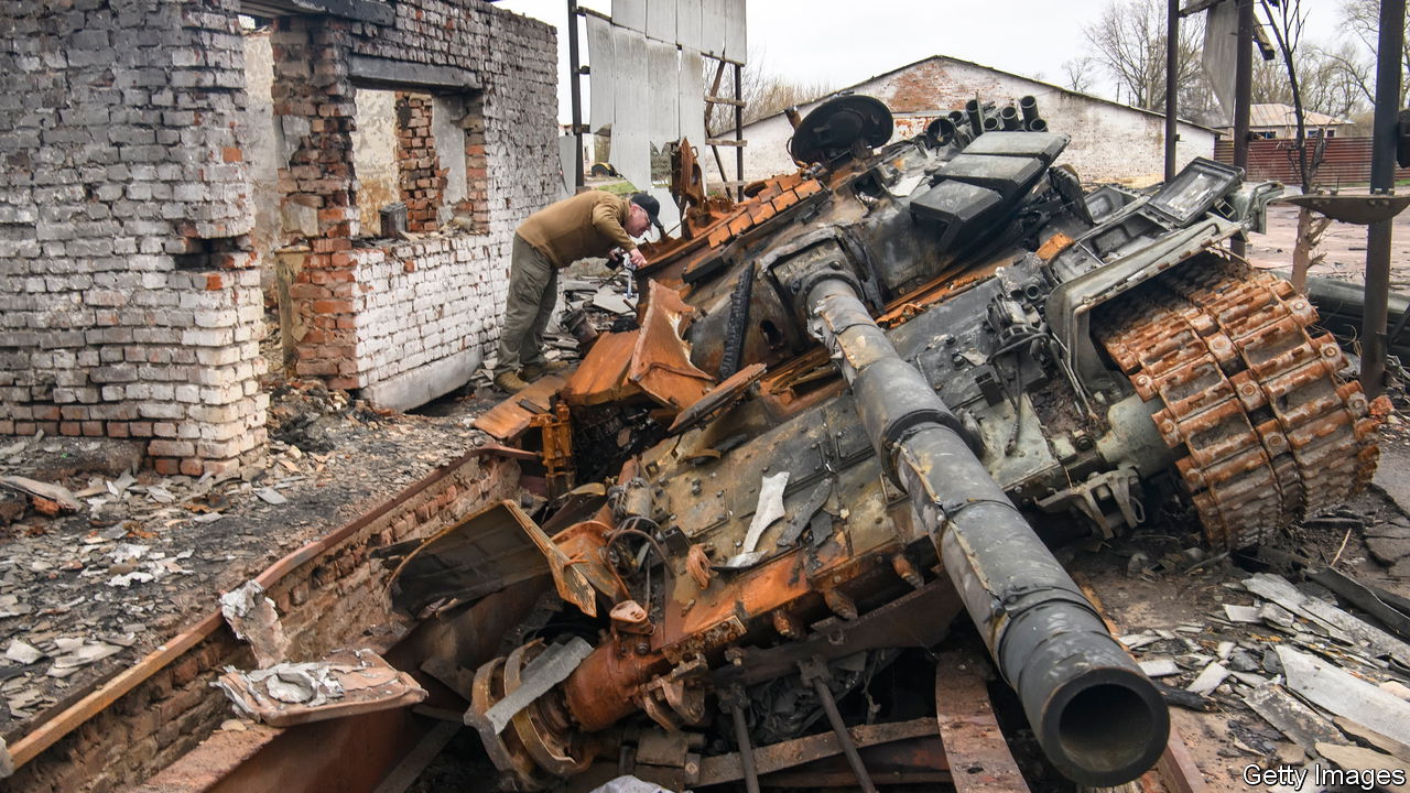 A man looks at russian T-72 tank destroyed during Russia's invasion to Uktaine, Ivanivka village, Chernihiv area, Ukraine, 20 April 2022 (Photo by Maxym Marusenko/NurPhoto via Getty Images)