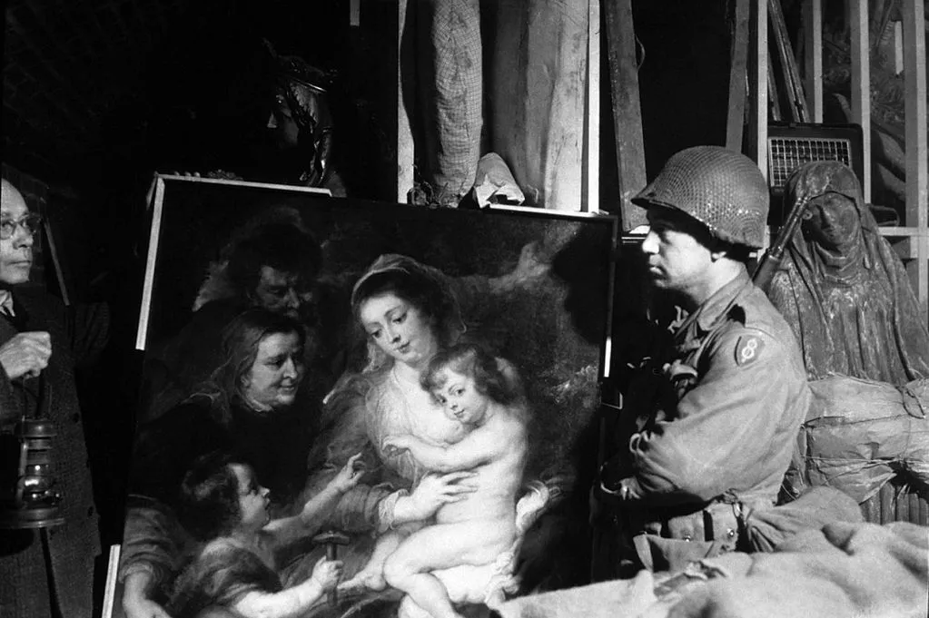 A-US-Soldier-inspects-priceless-art-taken-from-the-Jews-by-the-Nazis-and-stashed-in-the-Heilbron-salt-mines.jpg