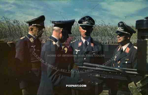stock-photo-german-luftwaffe-general-staff-officers-inspect-flak-gun-russia-1941-spanish-cross-ribbon-bar-3-flak-abt-701--8047.jpg