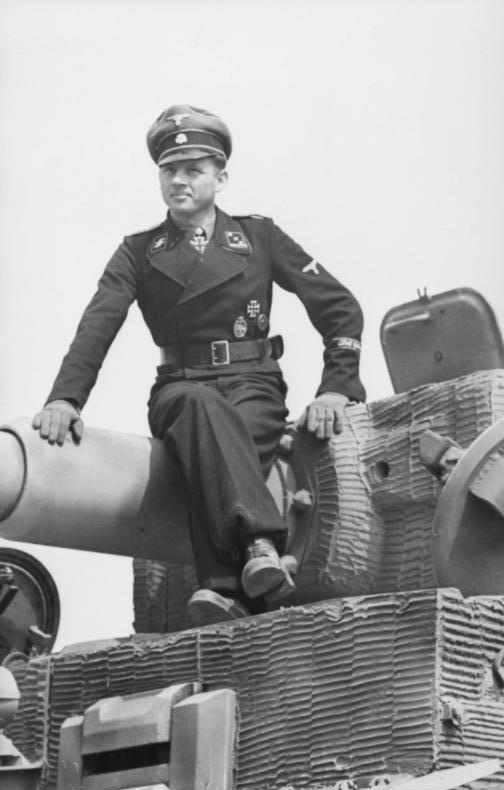 Bundesarchiv_Bild_101I-299-1802-08,_Nordfrankreich,_Michael_Wittmann_auf_Panzer_VI_(Tiger_I).jpg