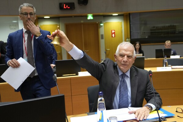 European Union foreign policy chief Josep Borrell rings a bell to signify the start of a meeting of EU foreign ministers at the European Council building in Brussels, Monday, March 18, 2024. European Union foreign ministers on monday will discuss Russia's aggression against Ukraine, Belarus, and the situation in the Middle East. (AP Photo/Virginia Mayo)'s aggression against Ukraine, Belarus, and the situation in the Middle East. (AP Photo/Virginia Mayo)
