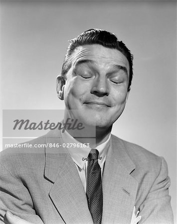 846-02796163em-1950s-man-smiling-eyes-closed-thinking-thoughtful-relaxed-smelling.jpg