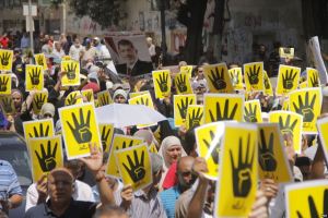 r4bia_sign_used_in_solidarity_with_victims_of_rabaa_crackdown_23-aug-2013.jpg