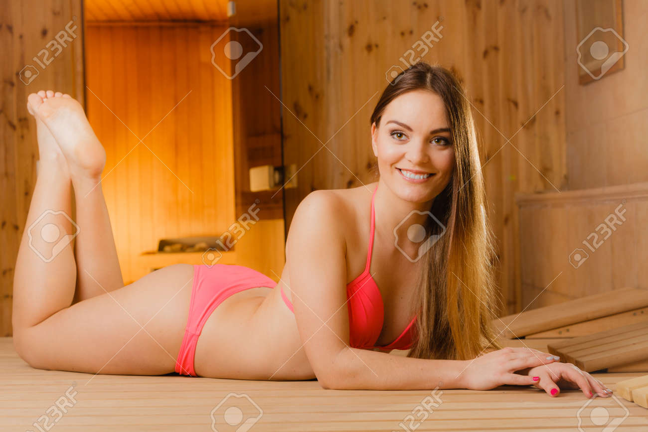 43879434-Young-woman-relaxing-in-wooden-finnish-sauna-Attractive-girl--Stock-Photo.jpg