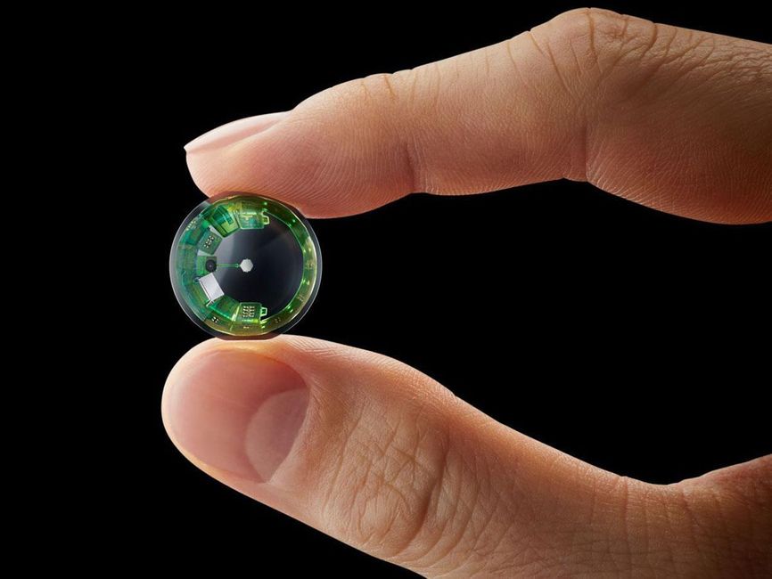 two-fingers-hold-a-contact-lens-with-a-ring-of-circuitry-on-its-outer-edge.jpg