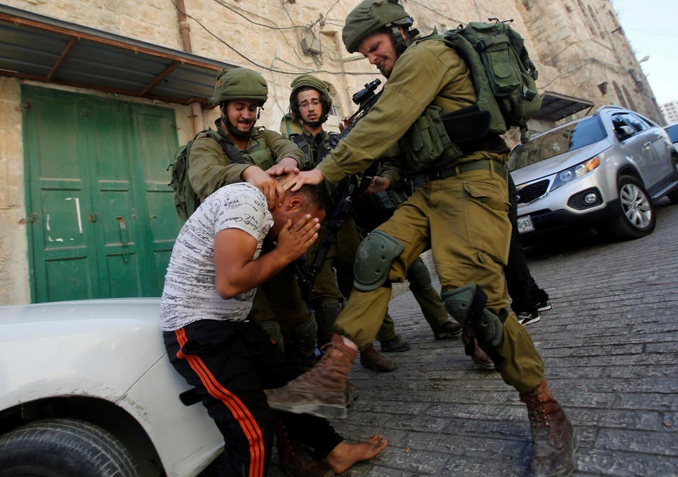israeli-kicking-reuters.jpg