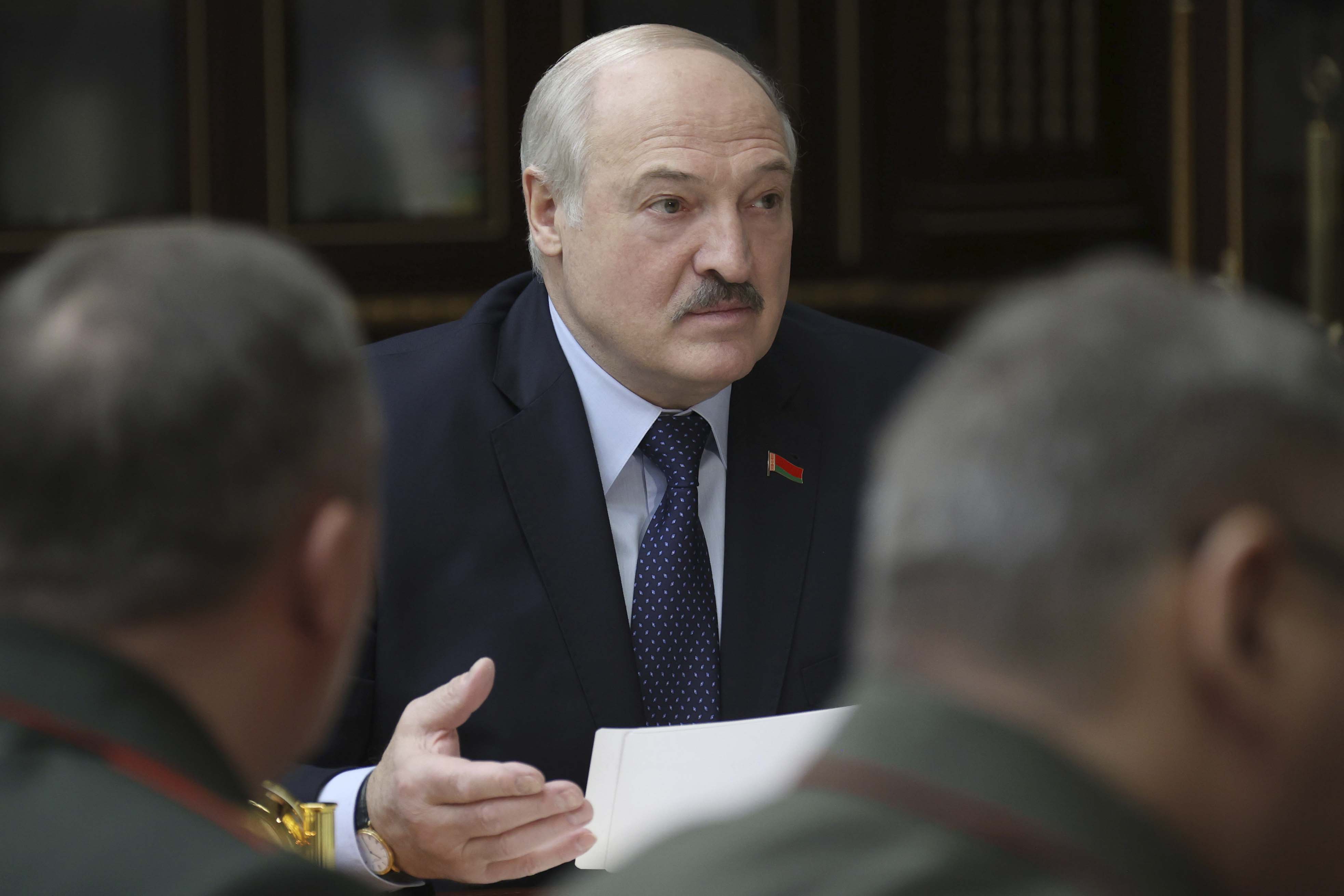 Belarusian President Alexander Lukashenko attends a meeting with military top officials in Minsk, Belarus. 