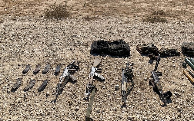 A collection of AK-47s carried by four Palestinians who attempted to infiltrate into Israel through the border fence with Gaza, August 10, 2019. (Israel Defense Forces)