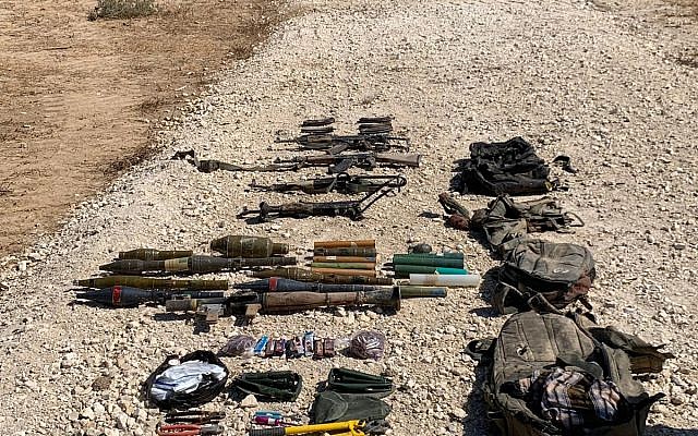 This photo released by the IDF shows a collection on weapons, including rifles, RPG launchers, grenades, bold cutters, and knives carried by four Gazans who tried to cross the border into Israel, August 10, 2019. (Israel Defense Forces)