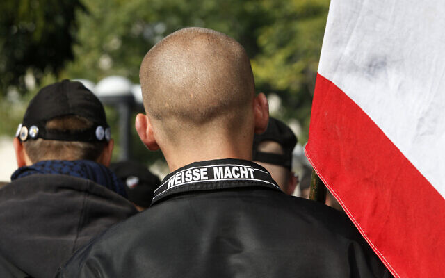 Illustrative -- A man wears a jacket with writing on the collar which reads 'White Power' at a neo-Nazi rally in Berlin, Oct. 10, 2009  (AP Photo)